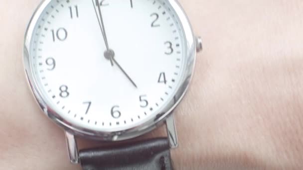 Close up of a Caucasian man wearing a wrist watch - Footage, Video