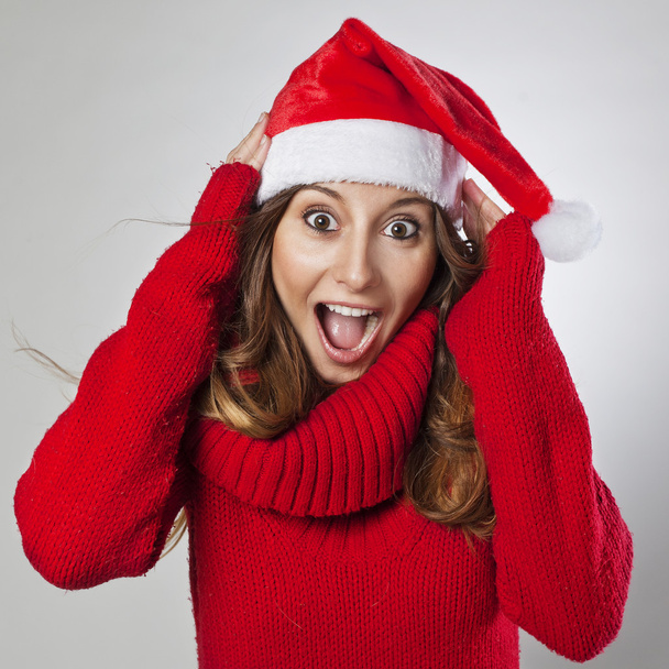 Happy and surprised beautiful Christmas woman - Zdjęcie, obraz