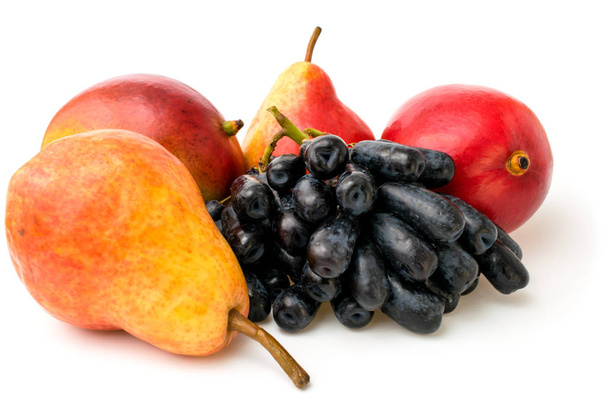 Ripe fresh fruits on a white background. - Foto, afbeelding
