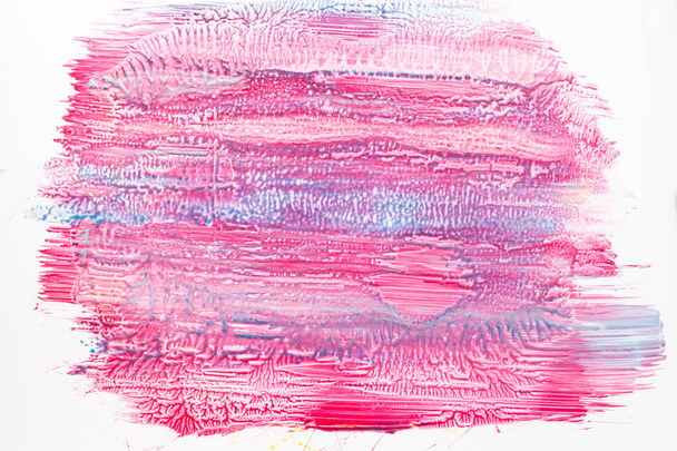 Pink nail polish background with blue smears - Foto, Imagem