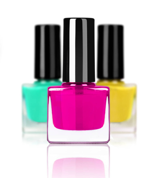 Group of colorful nail polishes isolated on white background  - Photo, image