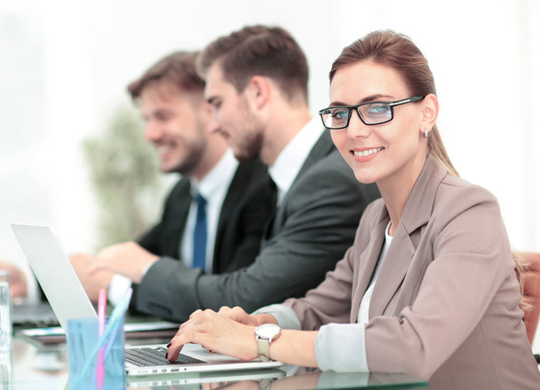 Portrait of happy business woman with  colleagues interacting on - Фото, зображення
