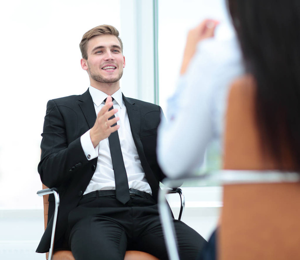 Portrait of confident business man discussing with his collegue - Foto, imagen