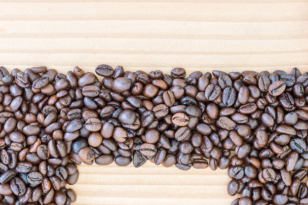 Kaffeebohne auf Holzboden - Foto, Bild