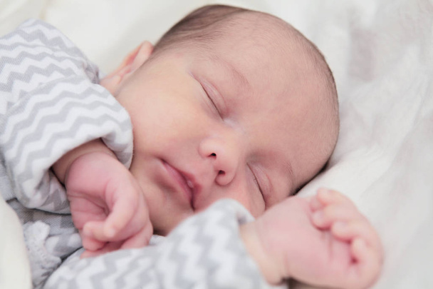 Cute newborn baby sleeping, face closeup - Fotografie, Obrázek