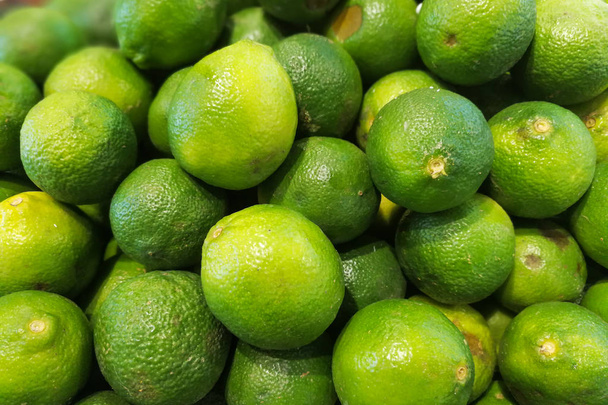 Heap of whole fresh organic lime - Photo, Image
