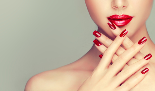 beautiful woman with  red manicure   - Photo, Image