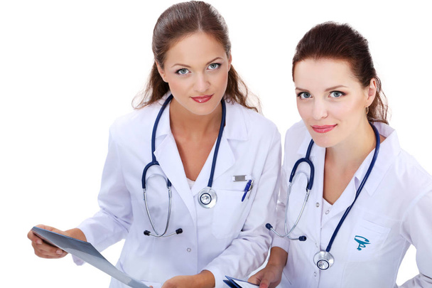 Two young woman doctor , standing in hospital - Foto, imagen