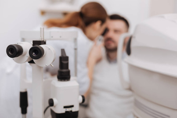 Selective focus of ophthalmological equipment being in use - Zdjęcie, obraz