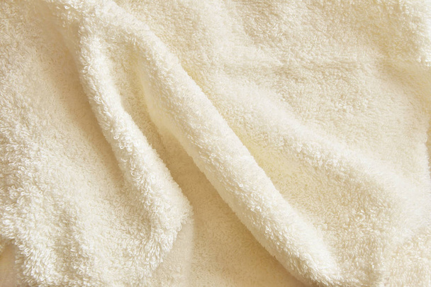 Toalla de algodón cremosa Terry Textura de tela
 - Foto, imagen