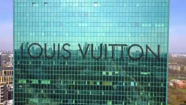 Aerial shot of office skyscraper with Louis Vuitton logo. Modern office building. Editorial 3D rendering 4K clip - Metraje, vídeo
