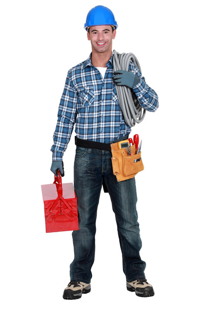 Portrait of a tradesman with his tools - Фото, зображення