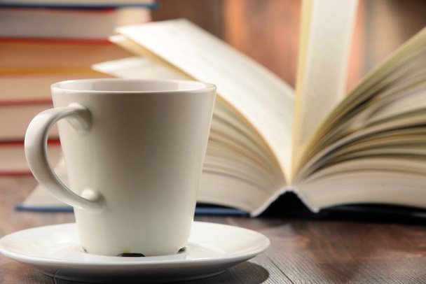 Composition with books and cup of coffee - Fotoğraf, Görsel