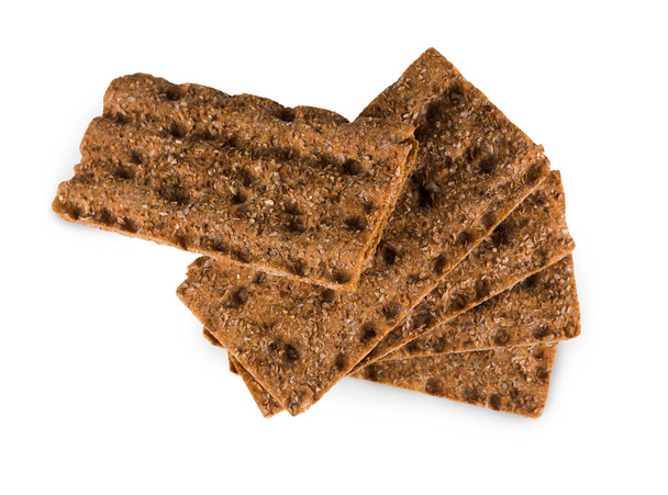 Rebanada de pan de centeno crujiente de grano entero aislado en blanco
 - Foto, Imagen