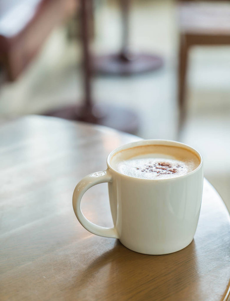 Coffee cup in coffee shop - Foto, imagen