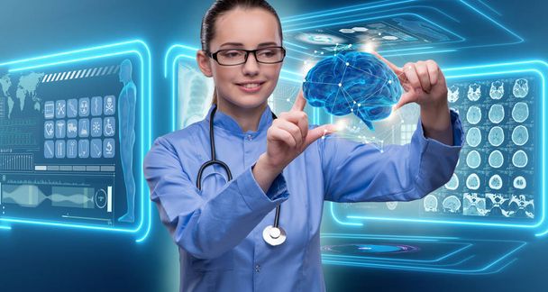 Female doctor with the brain in medical concept - Photo, Image