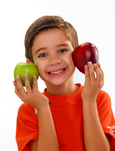 Little kid holding two fresh apples - Fotoğraf, Görsel