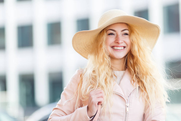 Beautiful young blonde in hat - Photo, image