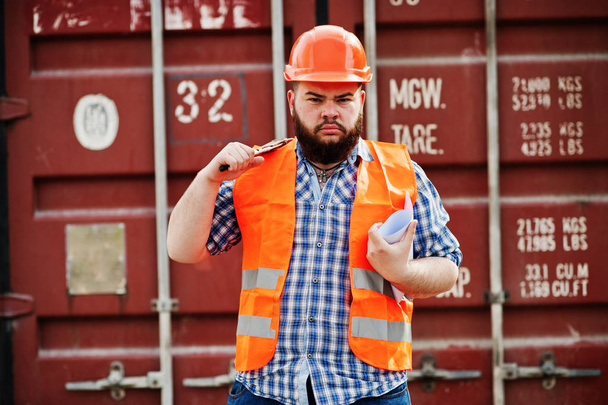 Brutal beard worker man suit construction worker in safety orang - Foto, imagen