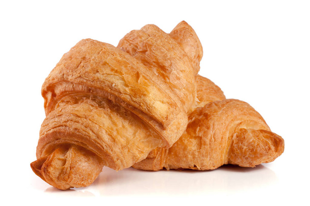 zwei Croissants isoliert über einem weißen Hintergrund Nahaufnahme - Foto, Bild