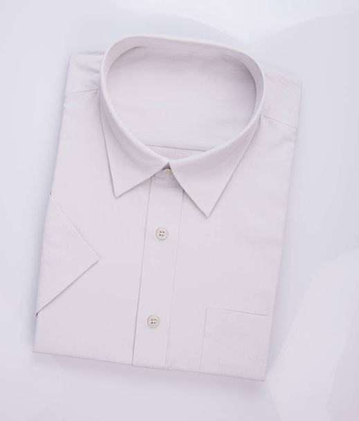 Shirt or men dress shirt on background. - Foto, Imagen