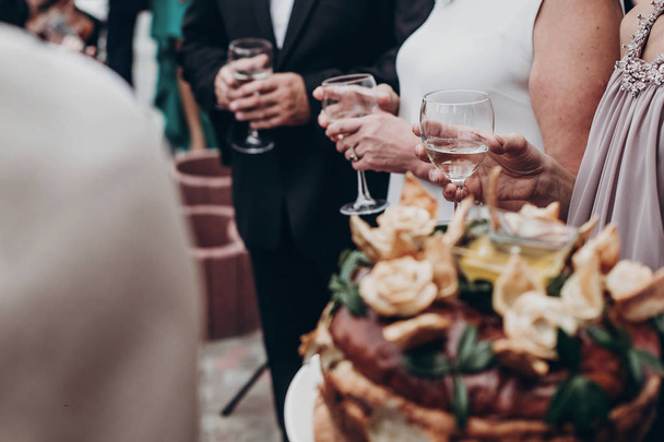 glasses in guests hands - Photo, Image