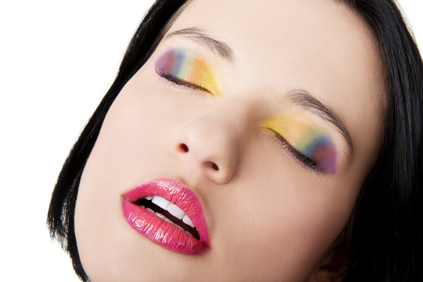 Beautiful woman with rainbow eye make up - Foto, Imagen