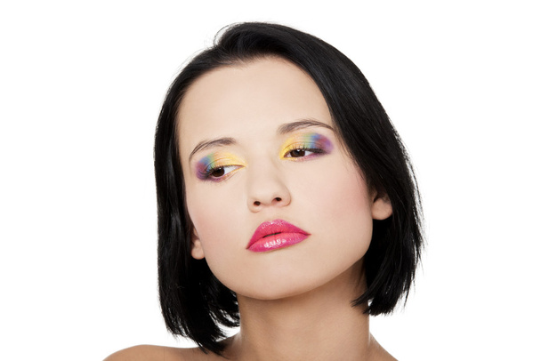 Beautiful woman with rainbow eye make up - Valokuva, kuva