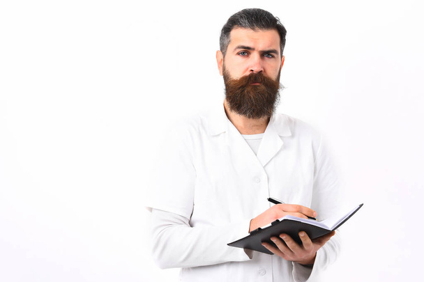Bearded brutal caucasian doctor or postgraduate student - Фото, зображення