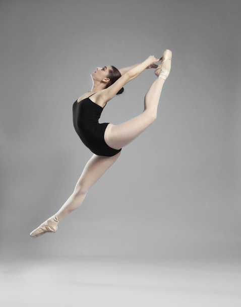 Young beautiful ballerina dancing - Photo, image
