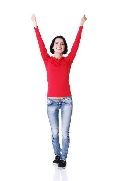 Excited young woman with fists up - Foto, immagini