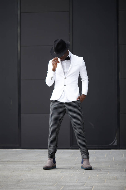 Good looking young black man in trendy clothes - Foto, Imagem