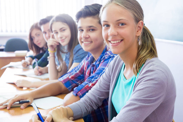 teens in classroom - Photo, image