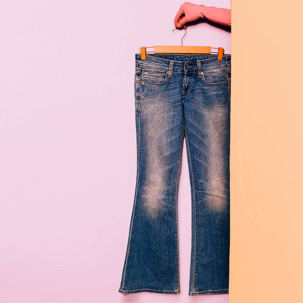 Stylish clothes. Flared jeans. Minimal fashion. Wardrobe Trends  - Zdjęcie, obraz