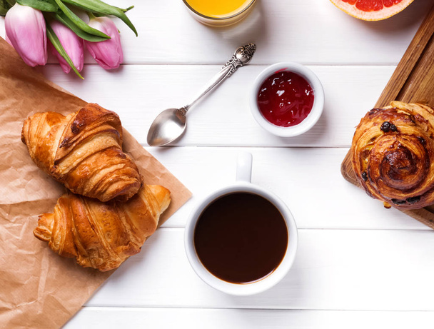 Breakfast with croissants and coffee - Фото, изображение