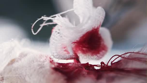 Close up shot of bloody surgical cloth - Imágenes, Vídeo