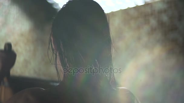Drops of water flow down the skin. Beautiful young woman. - Filmmaterial, Video
