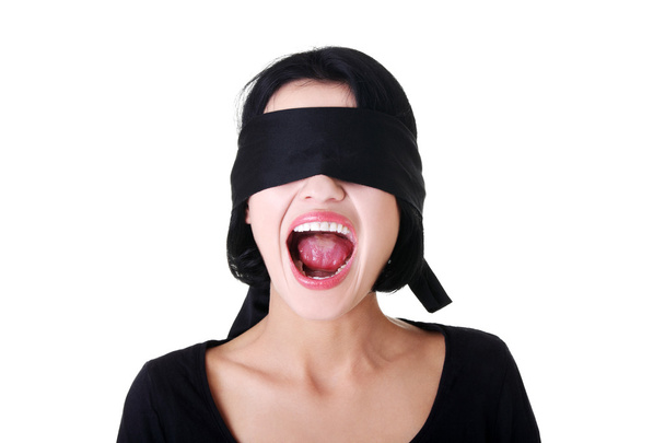 Frighten young blindfold woman screaming - Photo, Image