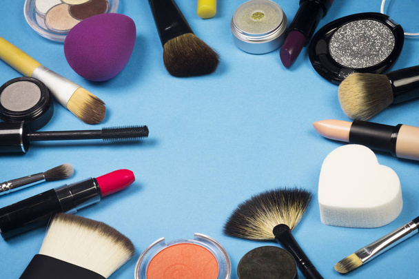makeup products on blue background - Photo, image