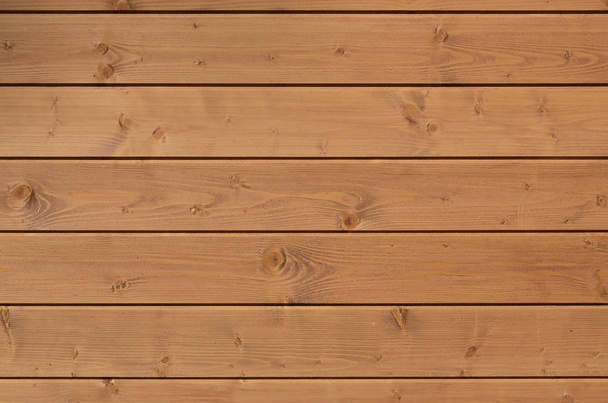 Texture of an old fence of horizontal orange wooden planks - Fotoğraf, Görsel