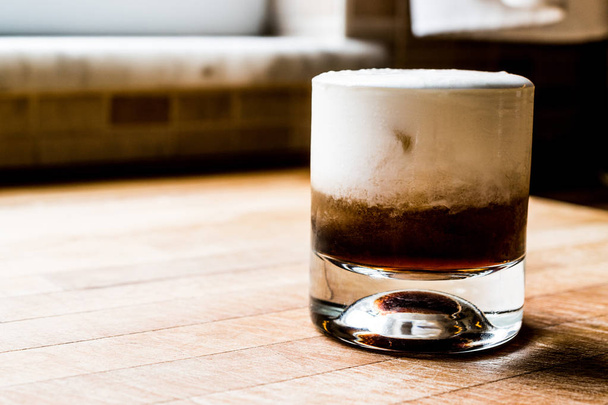 White Russian Cocktail on wooden surface. - Photo, Image