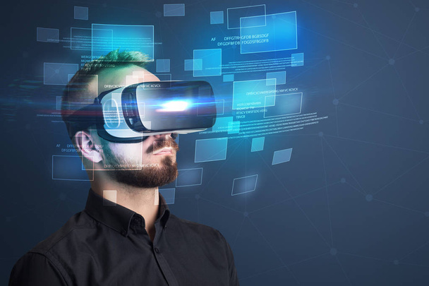 Businessman with virtual reality goggles - Valokuva, kuva