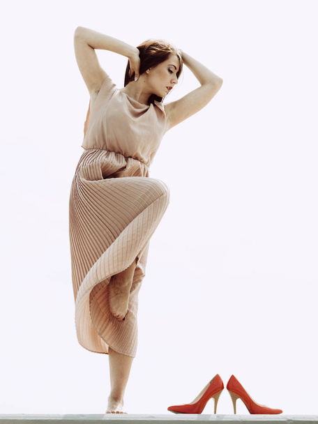 Woman in long dress elegant dress dancing - Valokuva, kuva