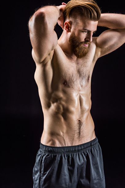 shirtless bodybuilder posing  - Fotografie, Obrázek