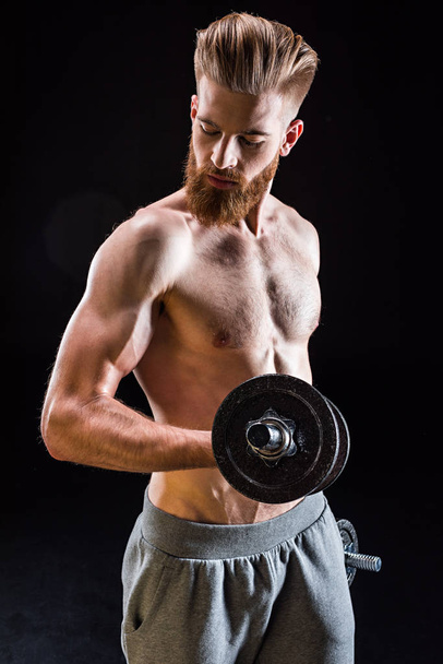 bodybuilder training with dumbbell - Foto, Imagem