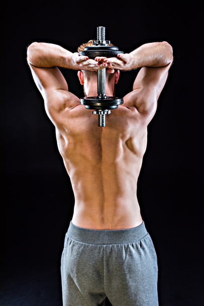 bodybuilder training with dumbbell - Photo, image