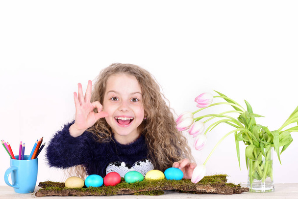 happy girl painter with pencil, tulip flowers, colorful easter eggs - Foto, immagini