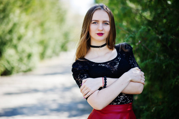 Portrait of girl with bright make up with red lips, black choker - Foto, imagen