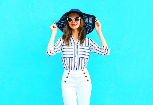 Fashion portrait young smiling woman wearing straw hat, white pa - 写真・画像