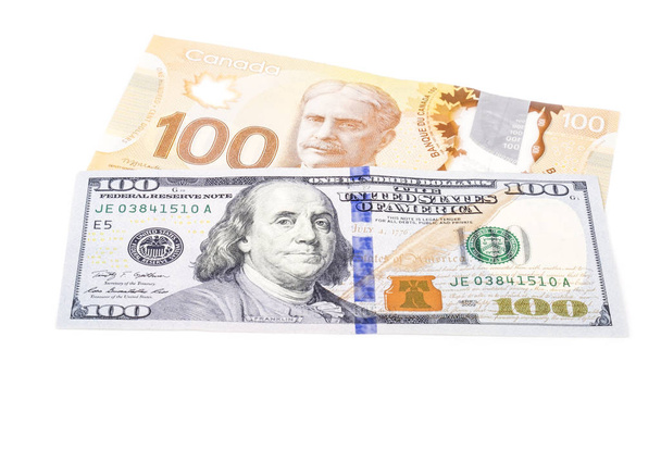 One Hundred US Dollar Bill Verses 100 Canadian Dollar Bill - Photo, Image